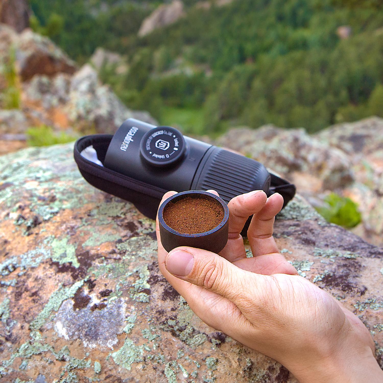 WACACO Nanopresso open showing 80ml water tank capacity and lined interior for safer pouring