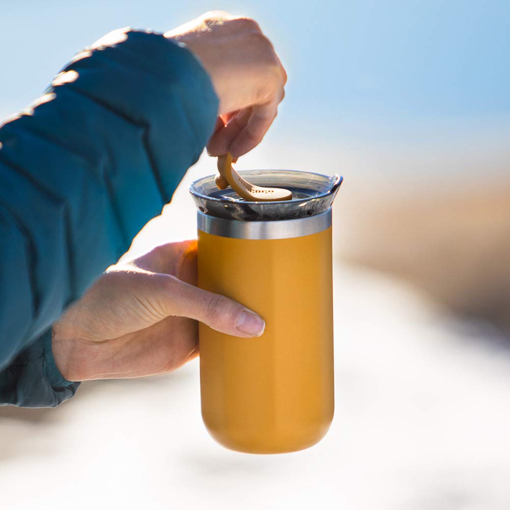 Hand holding WACACO Octaroma Lungo demonstrating comfortable grip and sipping convenience