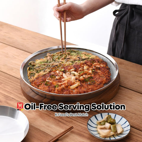 WAGENSTEIGER drip pan holding fresh fruit for tidy serving and liquid collection