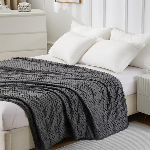 WAIBIO blanket next to a person to show 60x80 inch full‑body coverage scale