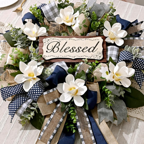 Waipfaru wreath hung on a front door creating welcoming entry presentation