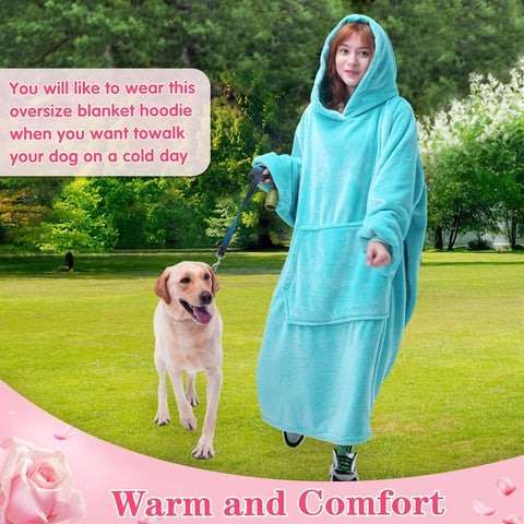 Waitu model lounging on couch in cyan wearable blanket conveying relaxed comfort