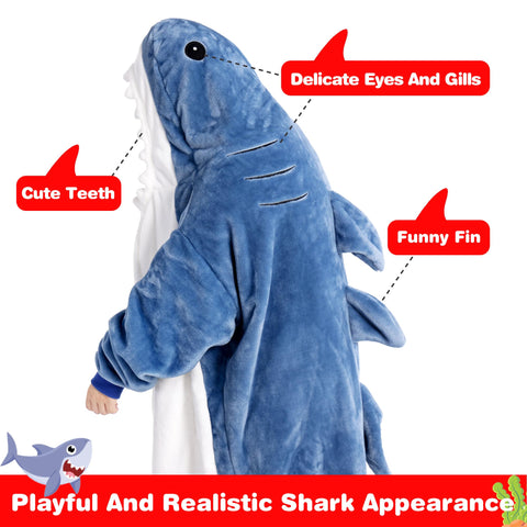 Person wearing Waitu shark hoodie lounging on sofa for relaxed comfort
