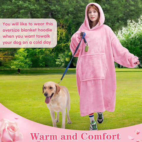 Waitu on sofa for size comparison, demonstrates full-coverage warmth