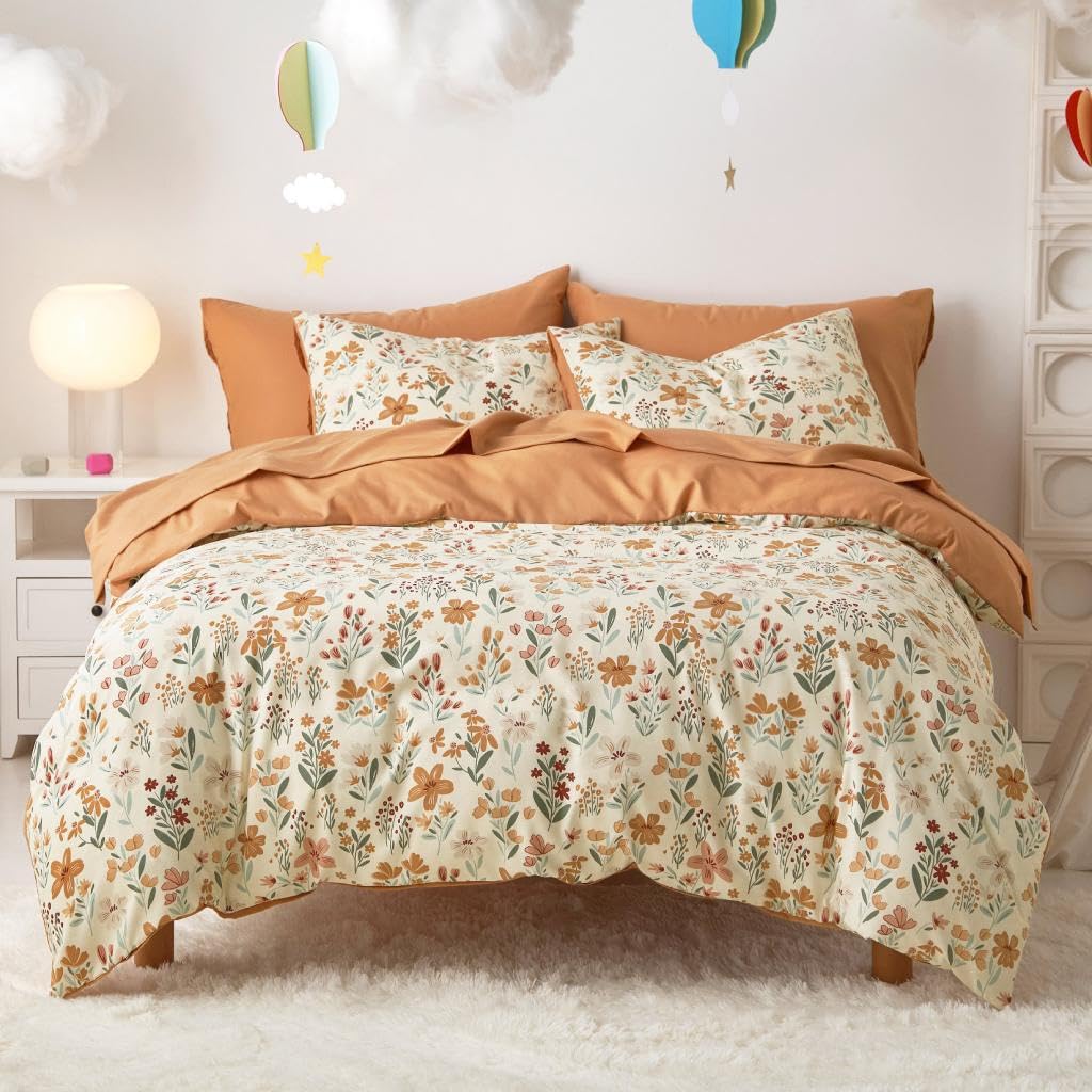 Wake In Cloud comforter front view showing orange cream floral pattern and cozy look