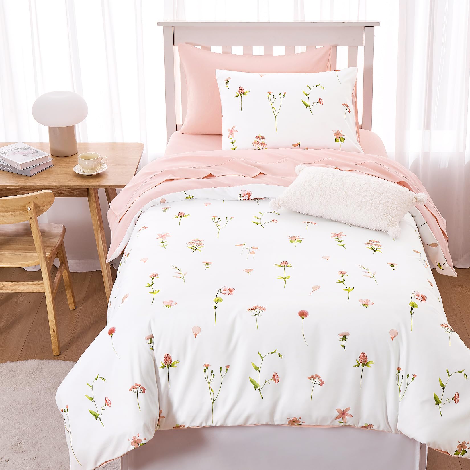 Wake In Cloud comforter on a styled Twin bed showing floral pattern and inviting bedroom aesthetic