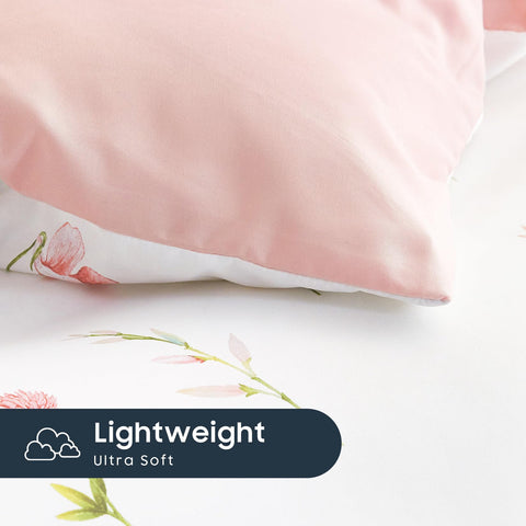 Wake In Cloud pillowcase close-up showing matching tiny-flower print and neat hem for coordinated look