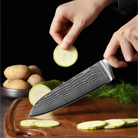 Wakoli small Santoku trimming herbs precisely to improve finishing and presentation