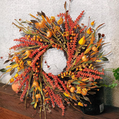 WANNA-CUL mini pumpkins and berries adding seasonal focal points