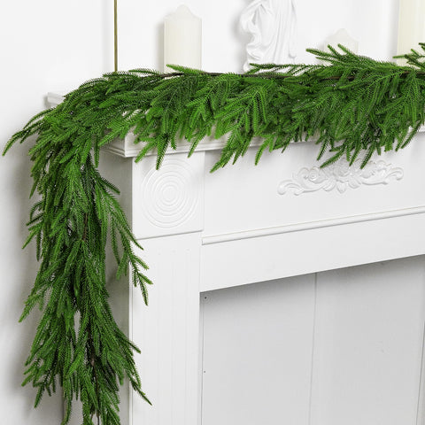 Watayo garland draped on mantel adding instant festive greenery and low-maintenance decor