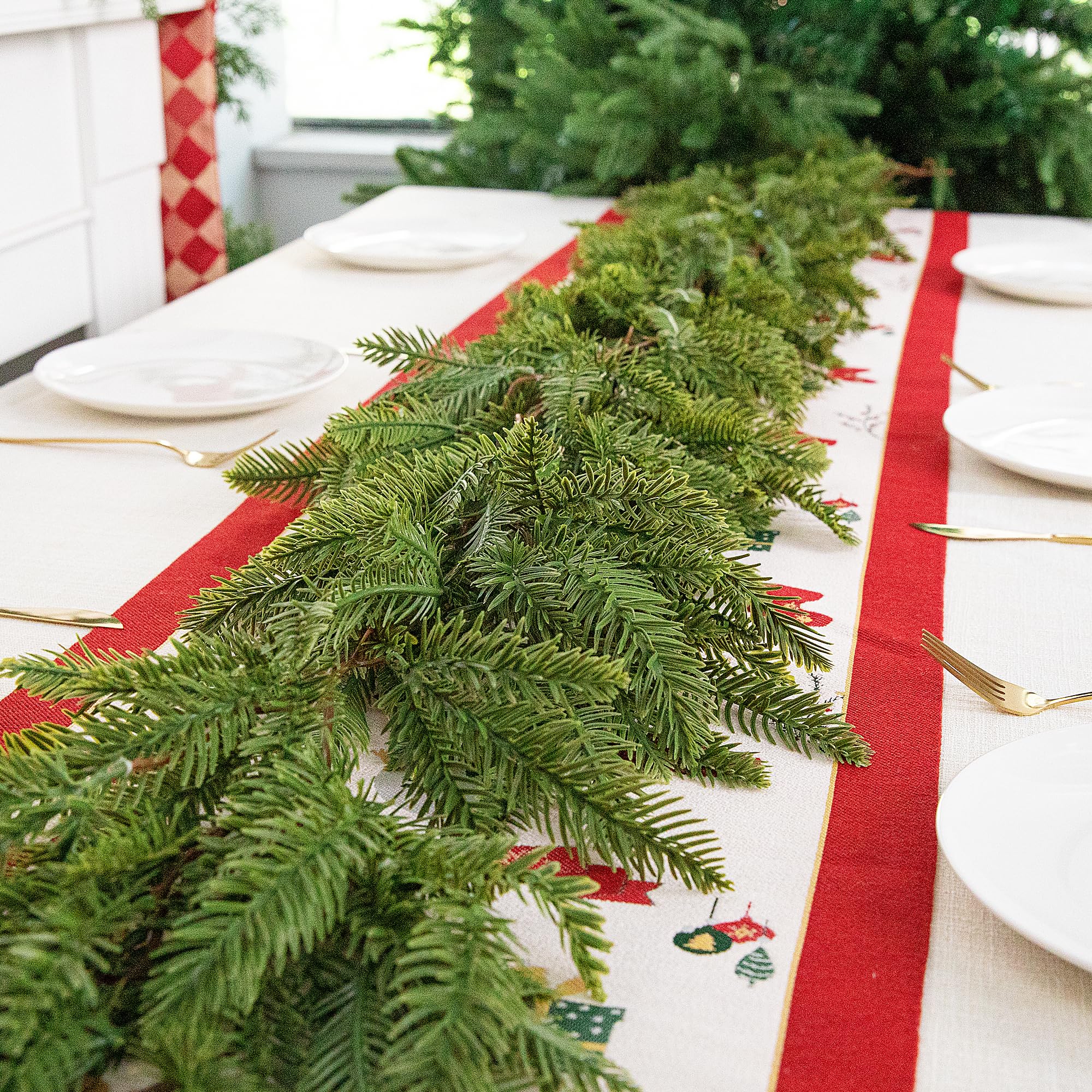Watayo garland wrapped around stair rail demonstrating easy styling