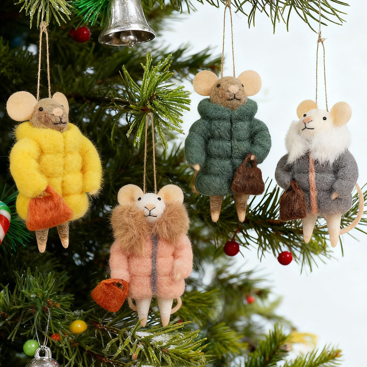 Watereem front view of four felt mice showing colors and hangers for easy styling
