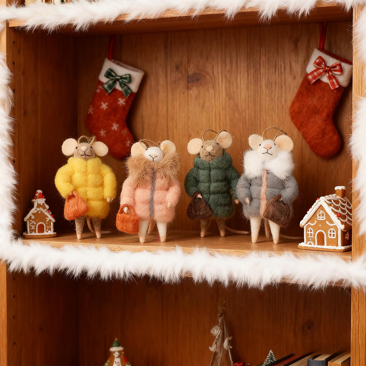 Watereem mice hanging on a Christmas tree adding cozy whimsical accents