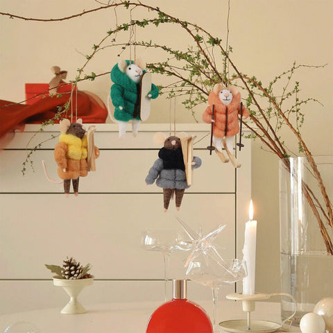 Watereem mice on a mantel illustrating seasonal home styling ideas
