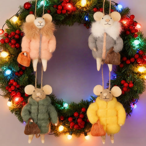 Watereem mice lined on a mantel bringing charming seasonal tabletop interest