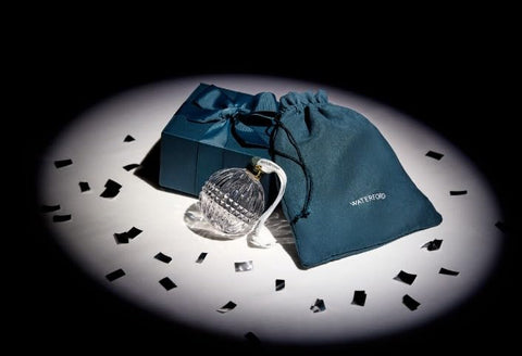 Waterford ornament in signature box and cloth pouch, ready for gifting and protection