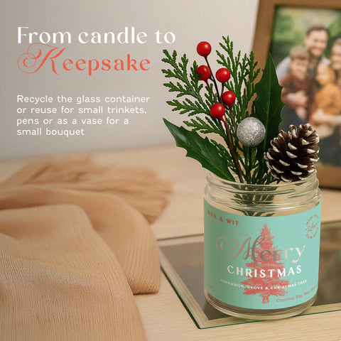 Wax & Wit candles lit in living room setting creating cozy holiday atmosphere