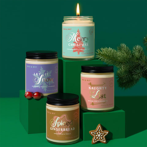 Wax & Wit scent labels close-up listing Merry Christmas, Spiced Gingerbread, Let It Snow, Naughty List
