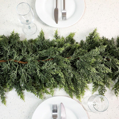 Waydress garland draped on mantel with lights for warm festive ambiance benefit
