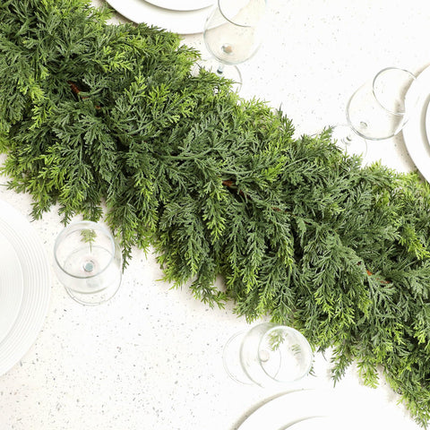 Waydress garland styled on a fireplace mantel providing warm, traditional holiday atmosphere