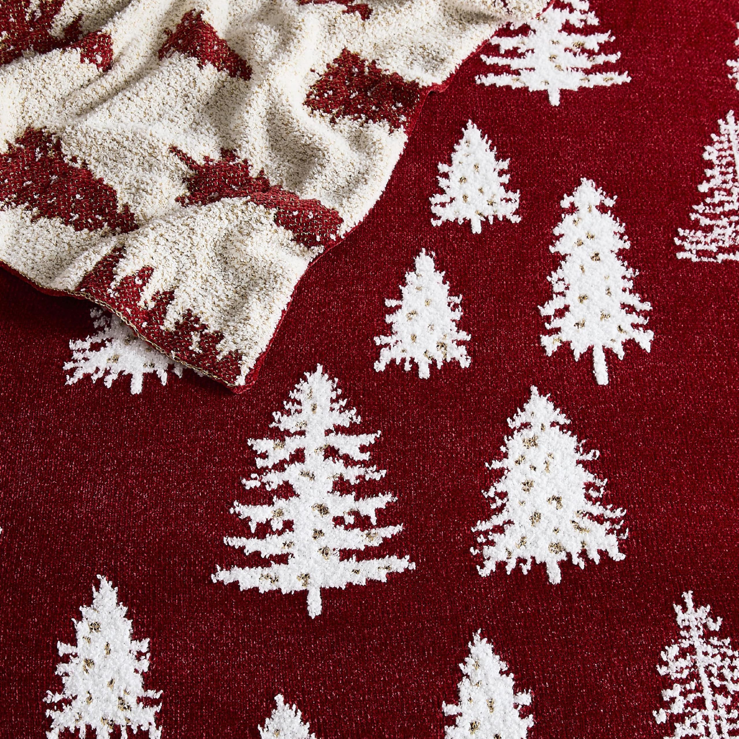 WDCOZY shown on lap to demonstrate 50x60 size and lightweight warmth