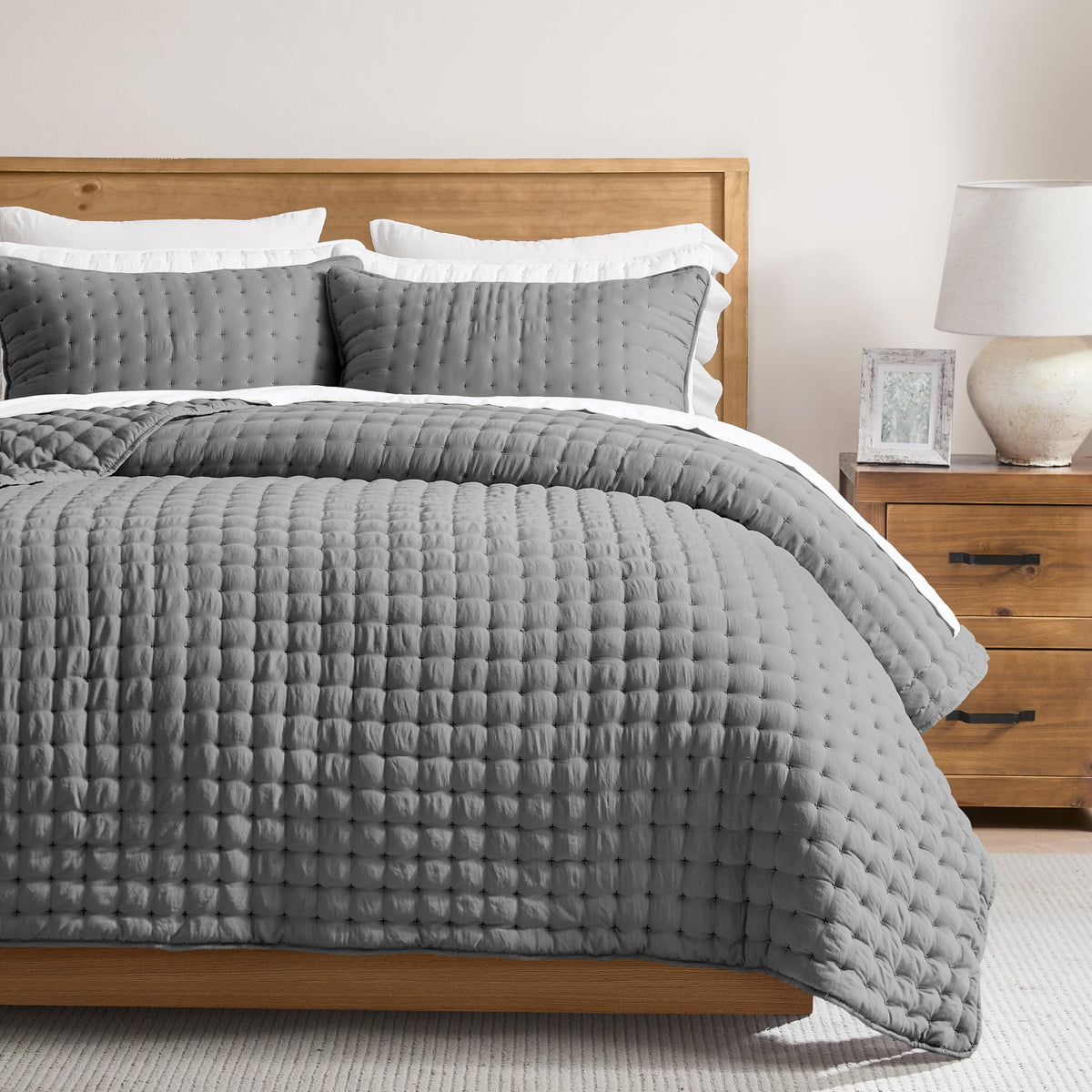 WDCOZY front view of dark grey king quilt showing neat drape and styling benefit