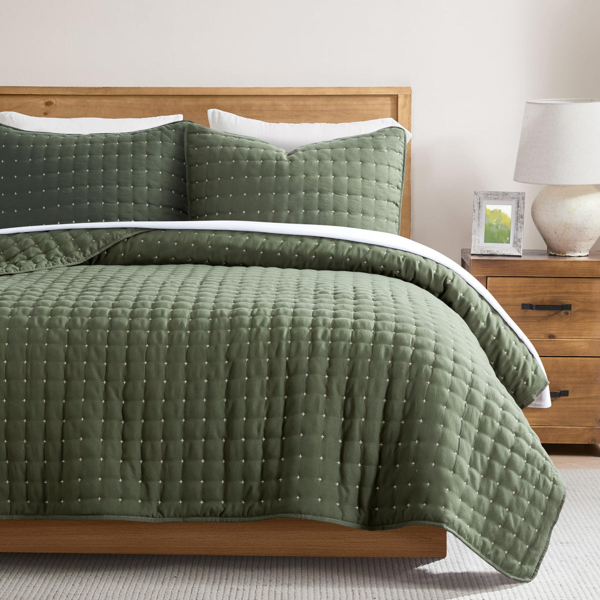 WDCOZY front view of moss green quilt set shows oversized drape and inviting look