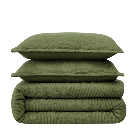 WDCOZY styled bedroom with olive quilt showing calming decor and inviting look