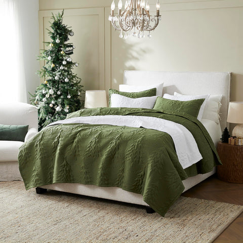 WDCOZY quilt draped on a California King bed demonstrating oversized fit