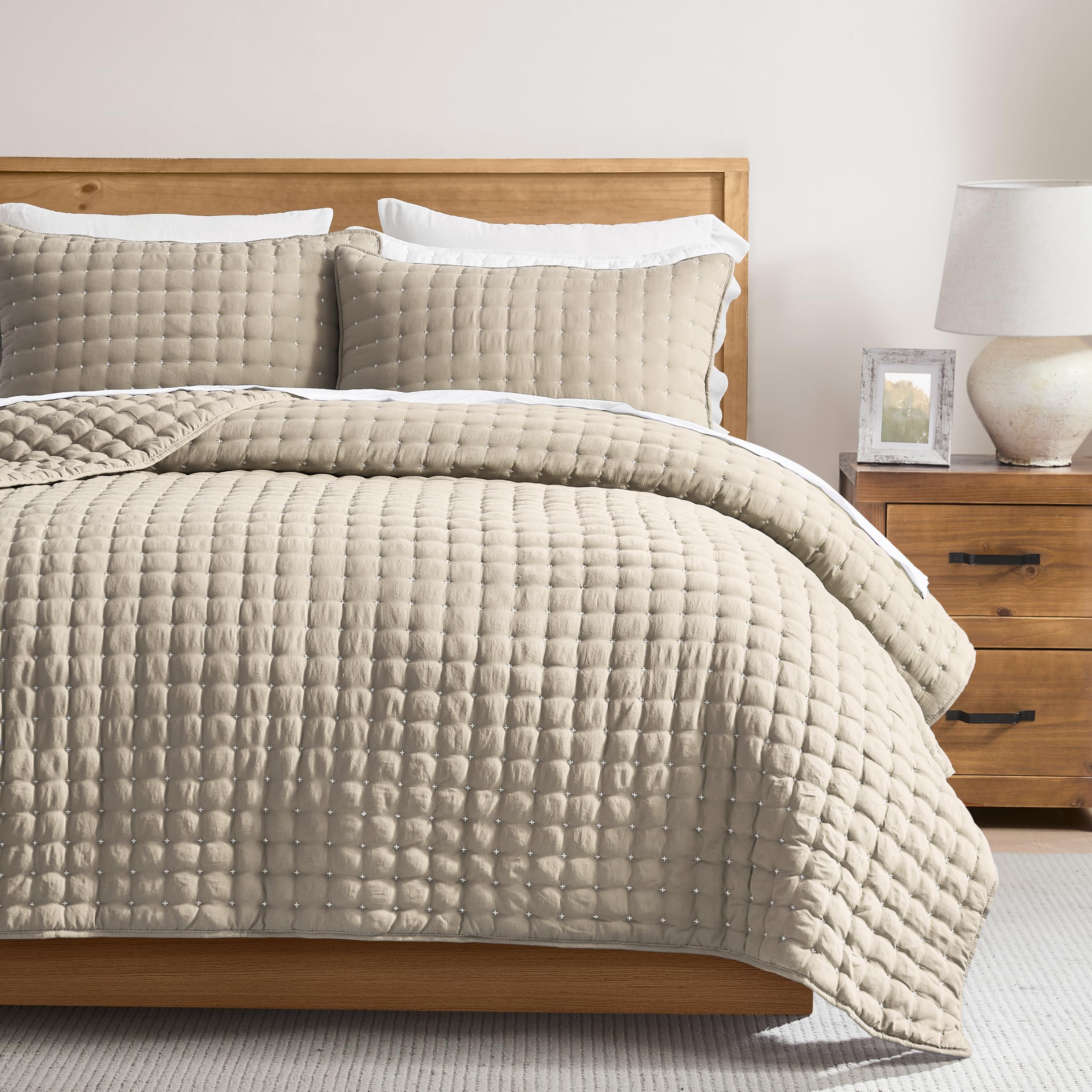 WDCOZY quilt front view showing neutral beige and white stitching, adds calm style