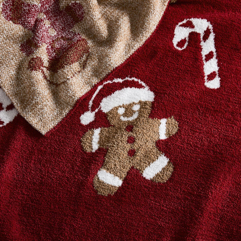 WDCOZY blanket styled at foot of bed adding seasonal color and warmth