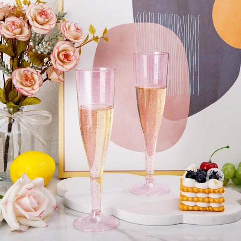 WDF pink glitter flutes styled at a wedding table offering coordinated décor benefit