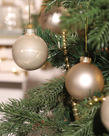 WDS WONDROUS ornaments hanging on a lit Christmas tree, creates warm shimmer