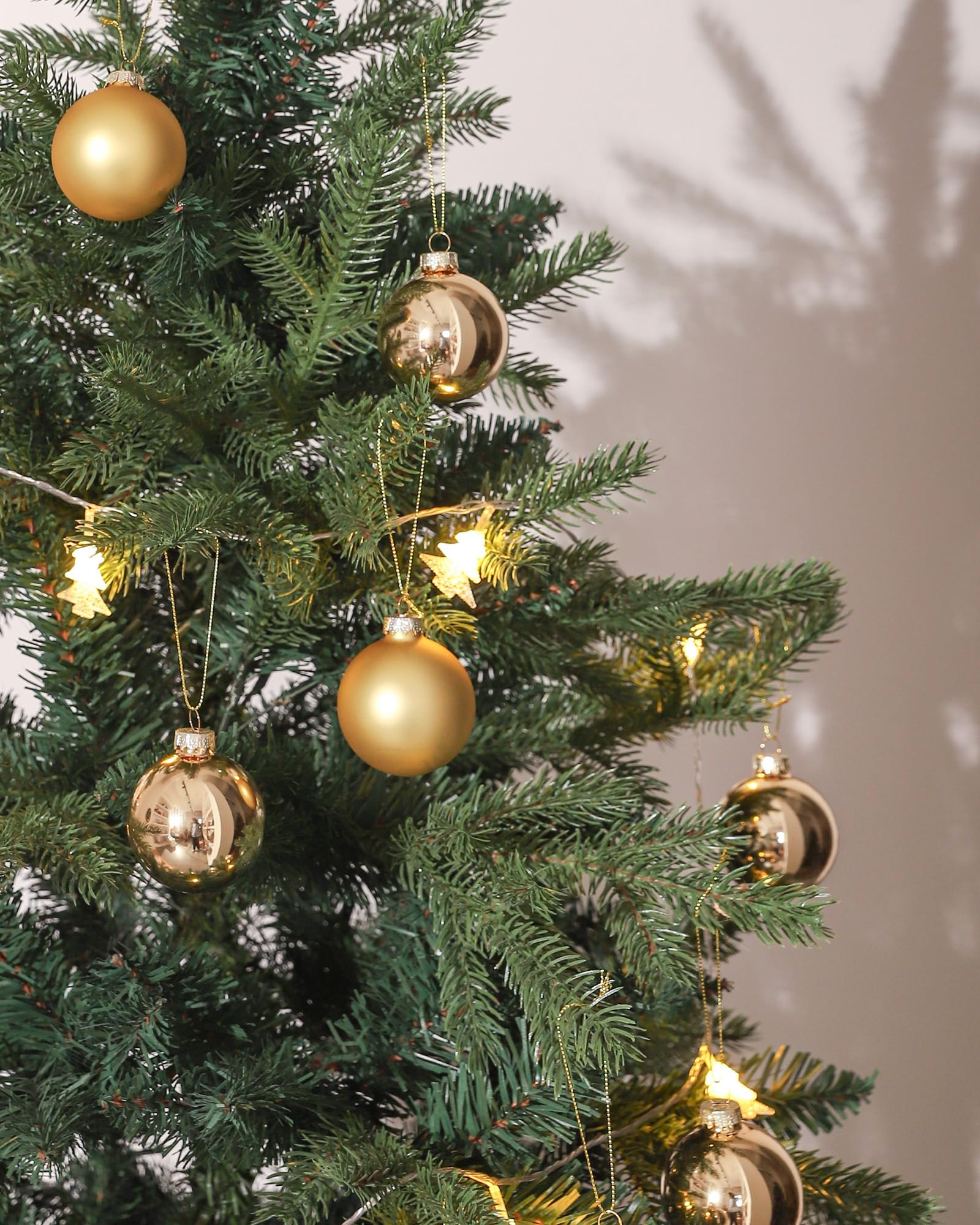 WDS WONDROUS matte gold ball detail emphasizing soft, elegant texture