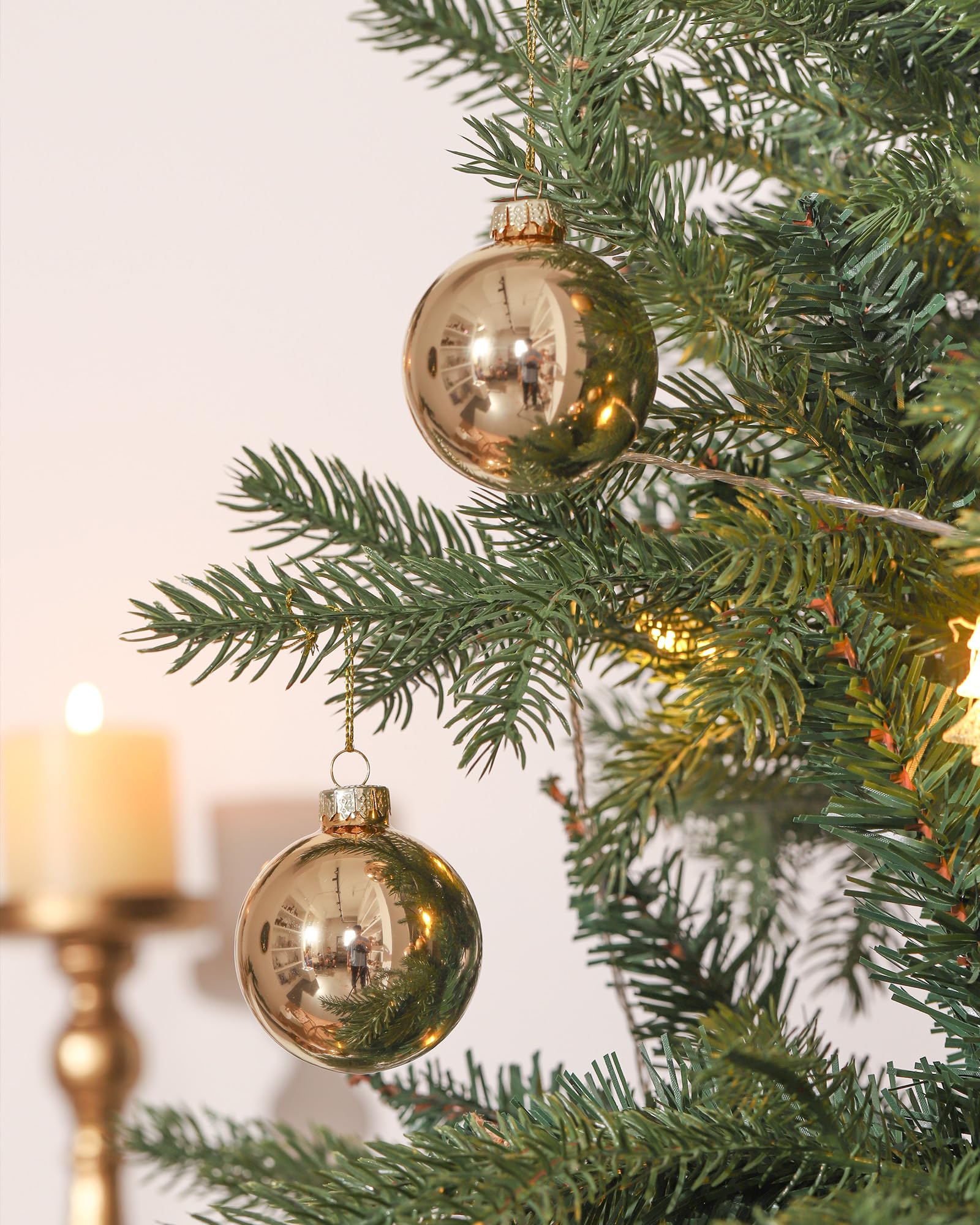 WDS WONDROUS ornaments hung on a Christmas tree adding balanced gold accents