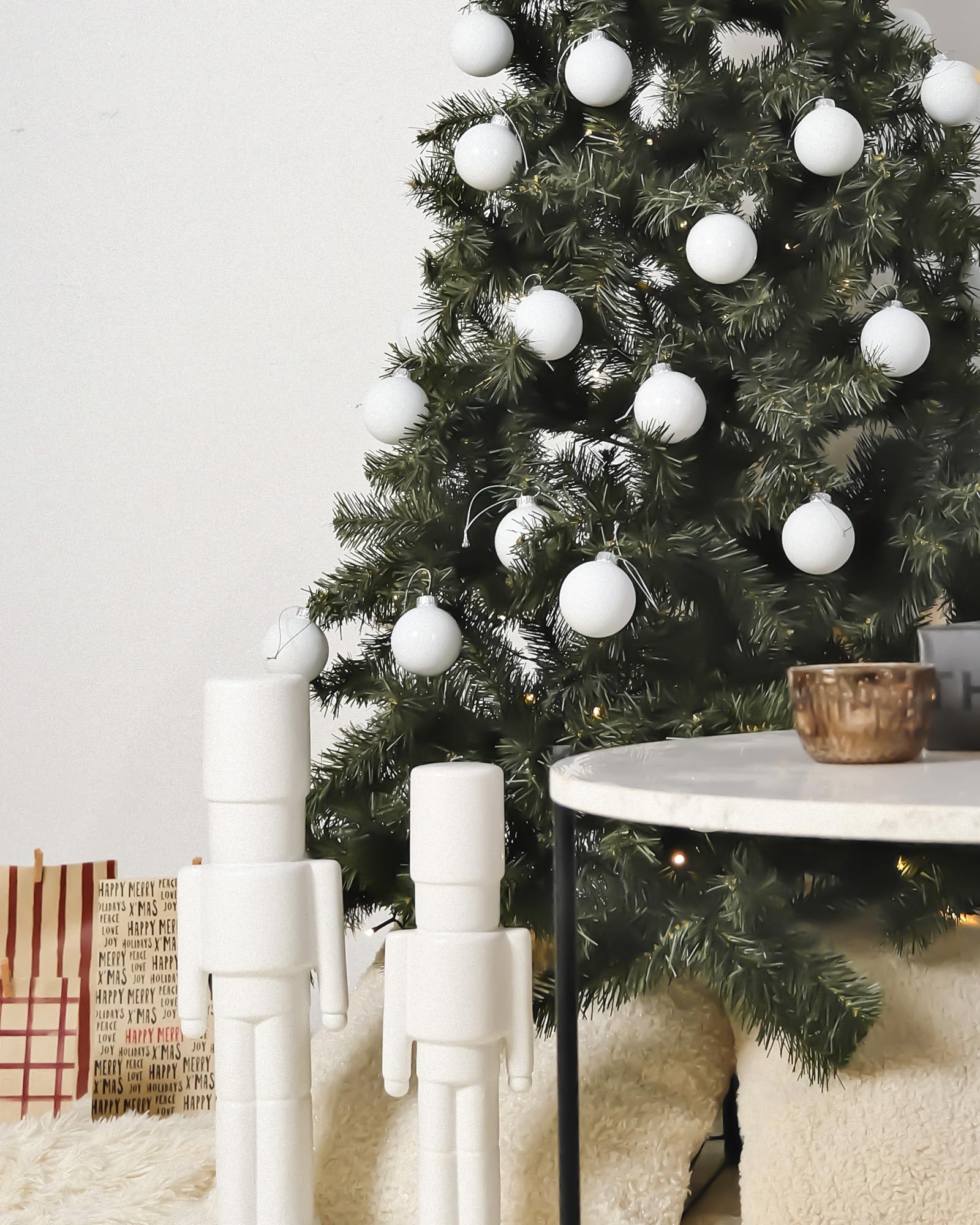 WDS WONDROUS ornaments hung on a tree creating cohesive winter decor