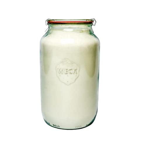 WECK jar filled with flour next to measuring cup showing bulk storage