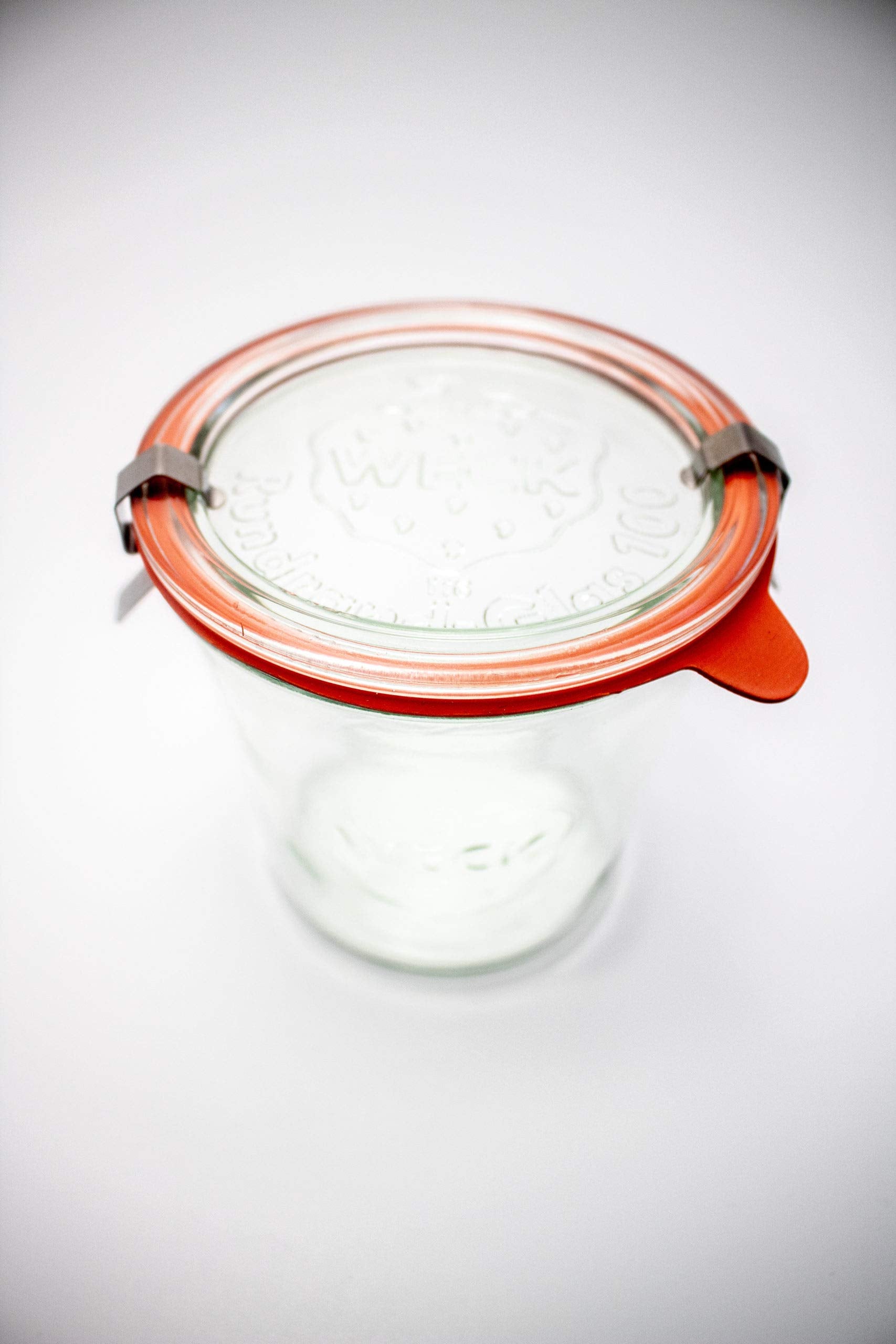 WECK jars stacked in fridge demonstrating space-saving storage advantage