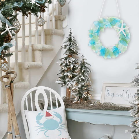 WeDoSoy sea glass wreath size comparison in hand to show compact scale