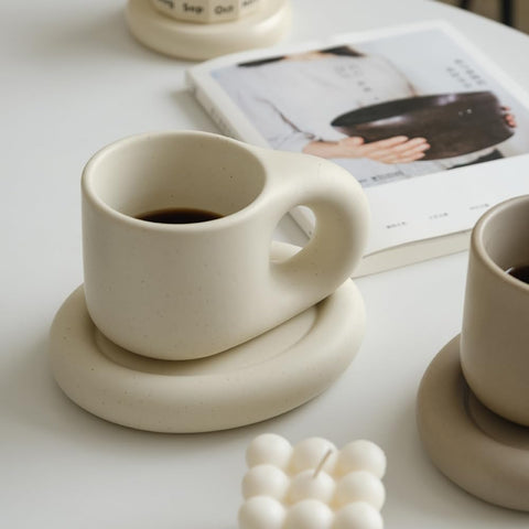 WENSHUO mug on saucer on table demonstrating tidy serving and protection