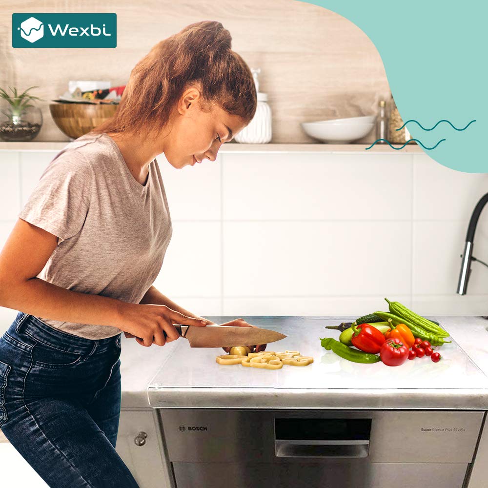 Wexbi cutting board styled on kitchen counter to show blend with decor and presentation