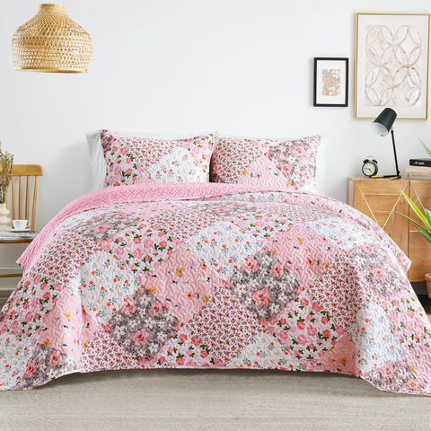 Whale Flotilla front view of queen floral quilt showing full pattern and layered benefit