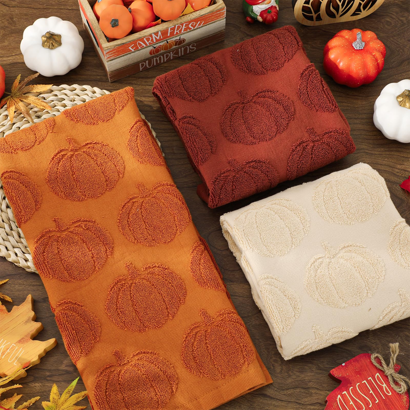 Whaline arrangement of beige orange brown towels showing color coordination benefit