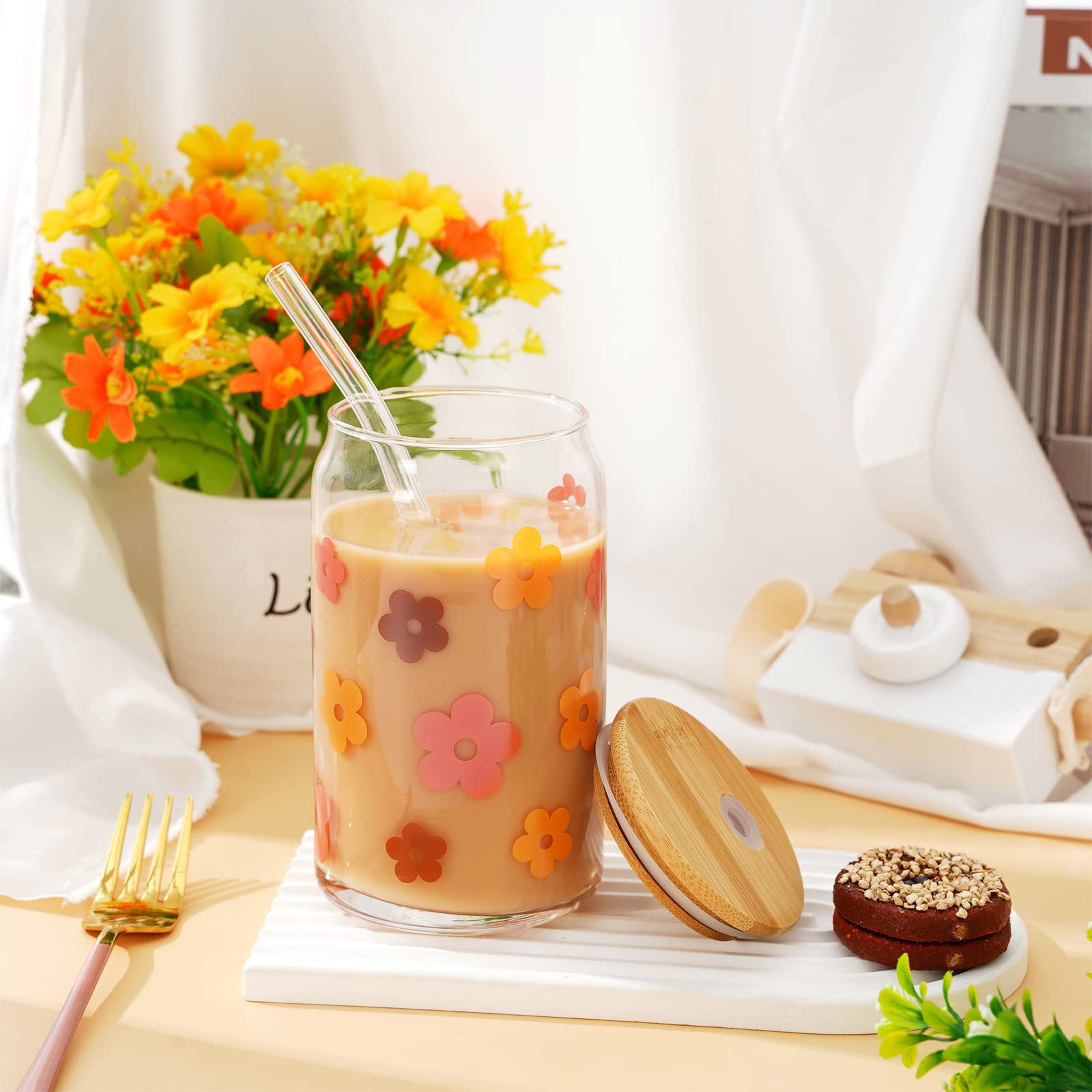 Whaline glass in use with iced coffee outdoors highlighting spill reduction benefit