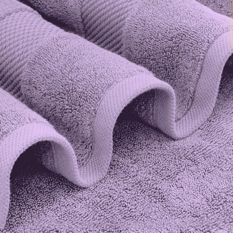 White Classic stacked bath towels demonstrating thickness and hotel-style luxury