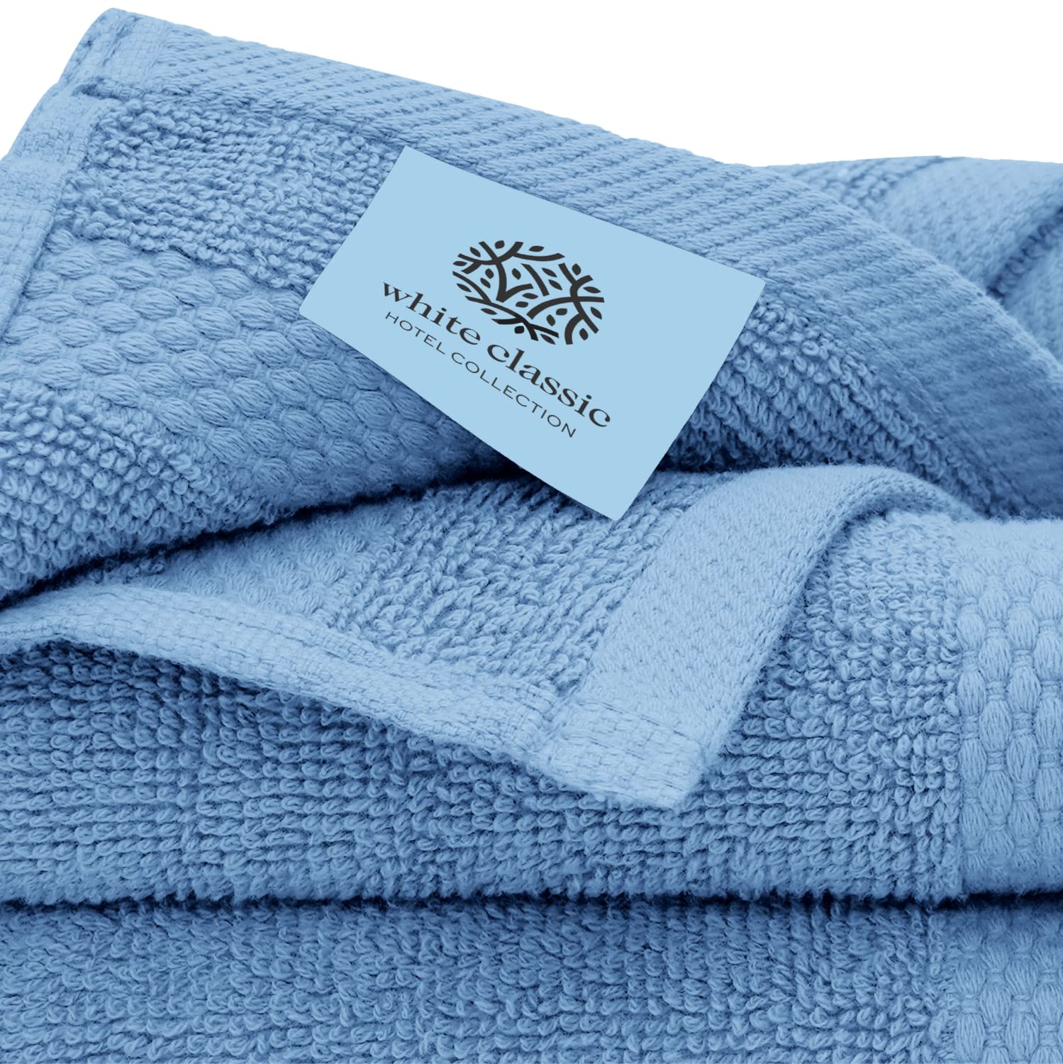 White Classic bath towels arranged in bathroom demonstrating spa-like upgrade