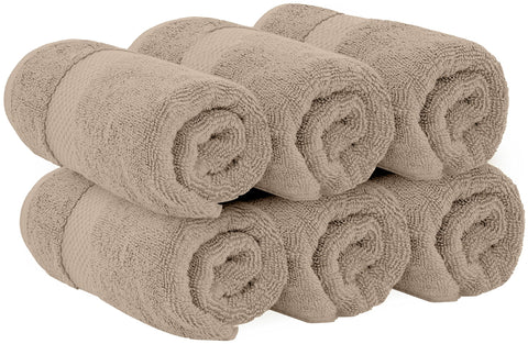White Classic towels styled on bathroom rack creating a spa-like neutral aesthetic