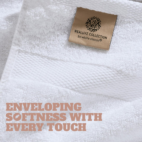 White Classic folded towels on shelf indicating organized storage