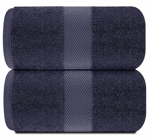 White Classic neatly folded stack of navy bath sheets illustrating tidy storage and value