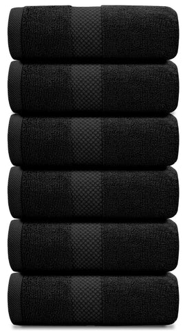 White Classic folded stack of six black towels highlighting neat storage and style